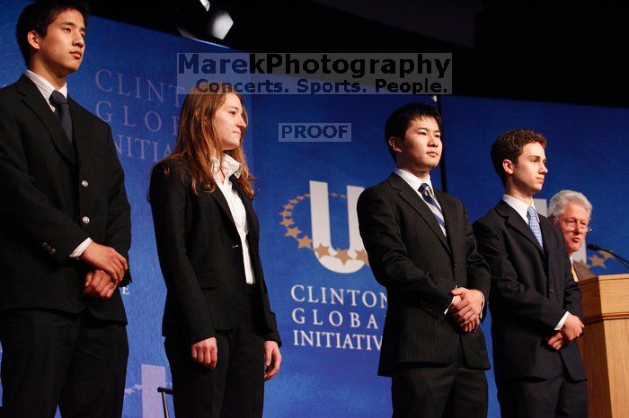 Former President Bill Clinton hands out commitment certificates to CGIU attendees for their exceptional pledges to the CGI cause during the opening plenary session of the CGIU meeting.  Day one of the 2nd Annual Clinton Global Initiative University (CGIU) meeting was held at The University of Texas at Austin, Friday, February 13, 2009.

Filename: SRM_20090213_16453413.jpg
Aperture: f/4.0
Shutter Speed: 1/125
Body: Canon EOS-1D Mark II
Lens: Canon EF 80-200mm f/2.8 L