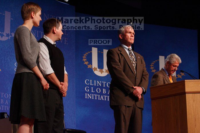 Former President Bill Clinton hands out commitment certificates to CGIU attendees for their exceptional pledges to the CGI cause during the opening plenary session of the CGIU meeting.  Day one of the 2nd Annual Clinton Global Initiative University (CGIU) meeting was held at The University of Texas at Austin, Friday, February 13, 2009.

Filename: SRM_20090213_16482051.jpg
Aperture: f/4.0
Shutter Speed: 1/200
Body: Canon EOS-1D Mark II
Lens: Canon EF 80-200mm f/2.8 L