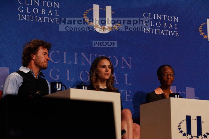 Blake Mycoskie (L), founder of TOMS shoes, Natalie Portman (C), and Mambidzeni Madzivire (R), BME graduate student at Mayo Graduate School, at the opening plenary session of the CGIU meeting.  Day one of the 2nd Annual Clinton Global Initiative University (CGIU) meeting was held at The University of Texas at Austin, Friday, February 13, 2009.

Filename: SRM_20090213_16541724.jpg
Aperture: f/4.0
Shutter Speed: 1/320
Body: Canon EOS-1D Mark II
Lens: Canon EF 80-200mm f/2.8 L