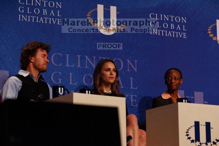 Blake Mycoskie (L), founder of TOMS shoes, Natalie Portman (C), and Mambidzeni Madzivire (R), BME graduate student at Mayo Graduate School, at the opening plenary session of the CGIU meeting.  Day one of the 2nd Annual Clinton Global Initiative University (CGIU) meeting was held at The University of Texas at Austin, Friday, February 13, 2009.

Filename: SRM_20090213_16541725.jpg
Aperture: f/4.0
Shutter Speed: 1/320
Body: Canon EOS-1D Mark II
Lens: Canon EF 80-200mm f/2.8 L