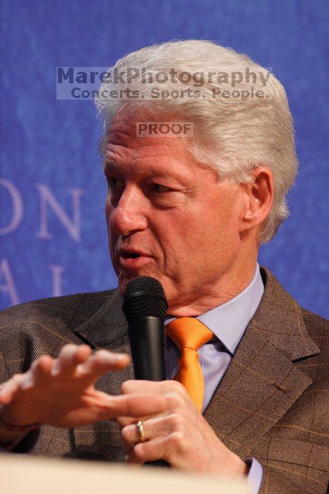 Former President Bill Clinton moderated the discussion between Natalie Portman, Mambidzeni Madzivire, BME graduate student at Mayo Graduate School, Blake Mycoskie, founder of TOMS shoes, and Paul Bell, president of Dell Global Public, during the first plenary session at the CGIU meeting.  Day one of the 2nd Annual Clinton Global Initiative University (CGIU) meeting was held at The University of Texas at Austin, Friday, February 13, 2009.

Filename: SRM_20090213_17003393.jpg
Aperture: f/4.0
Shutter Speed: 1/200
Body: Canon EOS 20D
Lens: Canon EF 300mm f/2.8 L IS