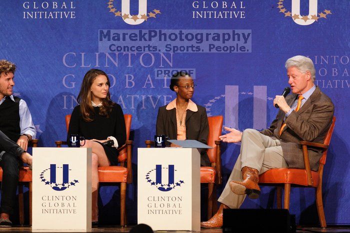 Blake Mycoskie (1-L), founder of TOMS shoes, Natalie Portman (2-L), Mambidzeni Madzivire (2-R), BME graduate student at Mayo Graduate School, and Former President Bill Clinton (1-R) at the first plenary session of the CGIU meeting.  Day one of the 2nd Annual Clinton Global Initiative University (CGIU) meeting was held at The University of Texas at Austin, Friday, February 13, 2009.

Filename: SRM_20090213_17015896.jpg
Aperture: f/4.0
Shutter Speed: 1/200
Body: Canon EOS 20D
Lens: Canon EF 300mm f/2.8 L IS