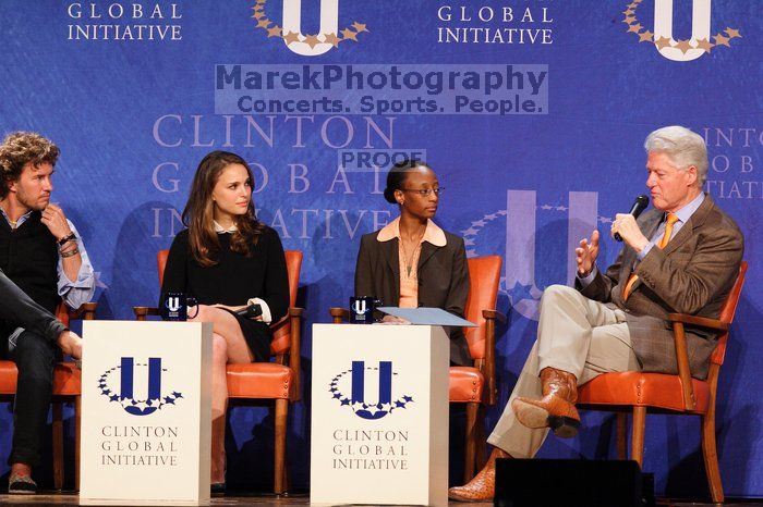 Blake Mycoskie (1-L), founder of TOMS shoes, Natalie Portman (2-L), Mambidzeni Madzivire (2-R), BME graduate student at Mayo Graduate School, and Former President Bill Clinton (1-R) at the first plenary session of the CGIU meeting.  Day one of the 2nd Annual Clinton Global Initiative University (CGIU) meeting was held at The University of Texas at Austin, Friday, February 13, 2009.

Filename: SRM_20090213_17021298.jpg
Aperture: f/4.0
Shutter Speed: 1/200
Body: Canon EOS 20D
Lens: Canon EF 300mm f/2.8 L IS