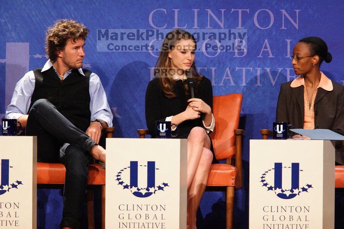 Blake Mycoskie (L), founder of TOMS shoes, Natalie Portman (C), and Mambidzeni Madzivire (R), BME graduate student at Mayo Graduate School, at the first plenary session of the CGIU meeting.  Day one of the 2nd Annual Clinton Global Initiative University (CGIU) meeting was held at The University of Texas at Austin, Friday, February 13, 2009.

Filename: SRM_20090213_17044822.jpg
Aperture: f/4.0
Shutter Speed: 1/200
Body: Canon EOS 20D
Lens: Canon EF 300mm f/2.8 L IS