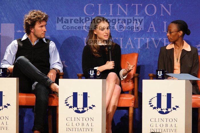 Blake Mycoskie (L), founder of TOMS shoes, Natalie Portman (C), and Mambidzeni Madzivire (R), BME graduate student at Mayo Graduate School, at the first plenary session of the CGIU meeting.  Day one of the 2nd Annual Clinton Global Initiative University (CGIU) meeting was held at The University of Texas at Austin, Friday, February 13, 2009.

Filename: SRM_20090213_17045123.jpg
Aperture: f/4.0
Shutter Speed: 1/200
Body: Canon EOS 20D
Lens: Canon EF 300mm f/2.8 L IS