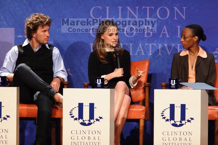 Blake Mycoskie (L), founder of TOMS shoes, Natalie Portman (C), and Mambidzeni Madzivire (R), BME graduate student at Mayo Graduate School, at the first plenary session of the CGIU meeting.  Day one of the 2nd Annual Clinton Global Initiative University (CGIU) meeting was held at The University of Texas at Austin, Friday, February 13, 2009.

Filename: SRM_20090213_17045225.jpg
Aperture: f/4.0
Shutter Speed: 1/200
Body: Canon EOS 20D
Lens: Canon EF 300mm f/2.8 L IS