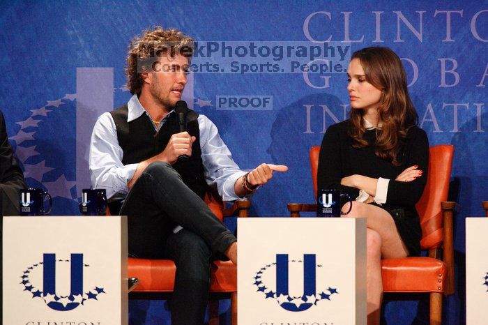 Blake Mycoskie (L), founder of TOMS shoes, and Natalie Portman (R) at the first plenary session of the CGIU meeting.  Day one of the 2nd Annual Clinton Global Initiative University (CGIU) meeting was held at The University of Texas at Austin, Friday, February 13, 2009.

Filename: SRM_20090213_17134888.jpg
Aperture: f/5.6
Shutter Speed: 1/200
Body: Canon EOS-1D Mark II
Lens: Canon EF 300mm f/2.8 L IS