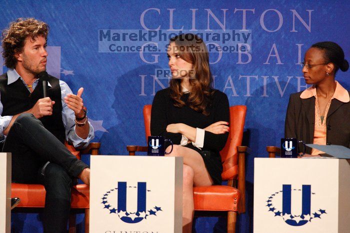 Blake Mycoskie (L), founder of TOMS shoes, Natalie Portman (C), and Mambidzeni Madzivire (R), BME graduate student at Mayo Graduate School, at the first plenary session of the CGIU meeting.  Day one of the 2nd Annual Clinton Global Initiative University (CGIU) meeting was held at The University of Texas at Austin, Friday, February 13, 2009.

Filename: SRM_20090213_17152804.jpg
Aperture: f/5.6
Shutter Speed: 1/200
Body: Canon EOS-1D Mark II
Lens: Canon EF 300mm f/2.8 L IS