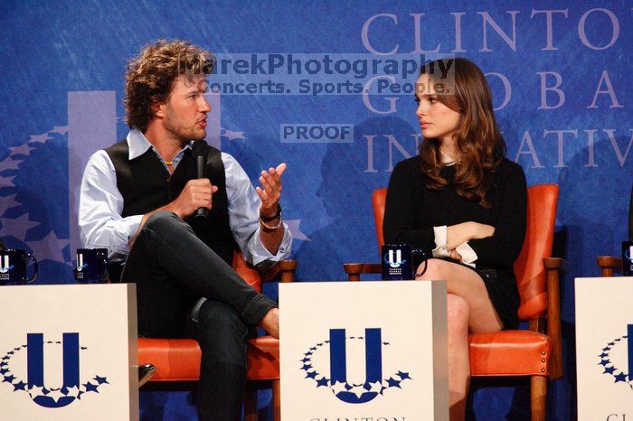 Blake Mycoskie (L), founder of TOMS shoes, and Natalie Portman (R) at the first plenary session of the CGIU meeting.  Day one of the 2nd Annual Clinton Global Initiative University (CGIU) meeting was held at The University of Texas at Austin, Friday, February 13, 2009.

Filename: SRM_20090213_17161706.jpg
Aperture: f/5.6
Shutter Speed: 1/200
Body: Canon EOS-1D Mark II
Lens: Canon EF 300mm f/2.8 L IS