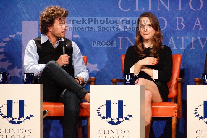 Blake Mycoskie (L), founder of TOMS shoes, and Natalie Portman (R) at the first plenary session of the CGIU meeting.  Day one of the 2nd Annual Clinton Global Initiative University (CGIU) meeting was held at The University of Texas at Austin, Friday, February 13, 2009.

Filename: SRM_20090213_17163711.jpg
Aperture: f/5.6
Shutter Speed: 1/200
Body: Canon EOS-1D Mark II
Lens: Canon EF 300mm f/2.8 L IS