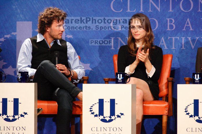 Blake Mycoskie (L), founder of TOMS shoes, and Natalie Portman (R) at the first plenary session of the CGIU meeting.  Day one of the 2nd Annual Clinton Global Initiative University (CGIU) meeting was held at The University of Texas at Austin, Friday, February 13, 2009.

Filename: SRM_20090213_17163916.jpg
Aperture: f/5.6
Shutter Speed: 1/200
Body: Canon EOS-1D Mark II
Lens: Canon EF 300mm f/2.8 L IS