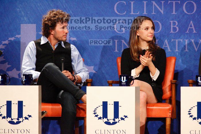 Blake Mycoskie (L), founder of TOMS shoes, and Natalie Portman (R) at the first plenary session of the CGIU meeting.  Day one of the 2nd Annual Clinton Global Initiative University (CGIU) meeting was held at The University of Texas at Austin, Friday, February 13, 2009.

Filename: SRM_20090213_17164017.jpg
Aperture: f/5.6
Shutter Speed: 1/200
Body: Canon EOS-1D Mark II
Lens: Canon EF 300mm f/2.8 L IS