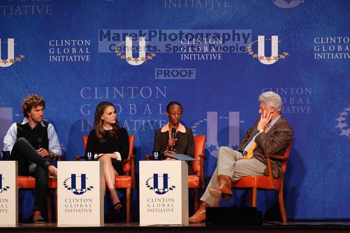 Blake Mycoskie (1-L), founder of TOMS shoes, Natalie Portman (2-L), Mambidzeni Madzivire (2-R), BME graduate student at Mayo Graduate School, and Former President Bill Clinton (1-R) at the first plenary session of the CGIU meeting.  Day one of the 2nd Annual Clinton Global Initiative University (CGIU) meeting was held at The University of Texas at Austin, Friday, February 13, 2009.

Filename: SRM_20090213_17290846.jpg
Aperture: f/4.0
Shutter Speed: 1/320
Body: Canon EOS-1D Mark II
Lens: Canon EF 300mm f/2.8 L IS