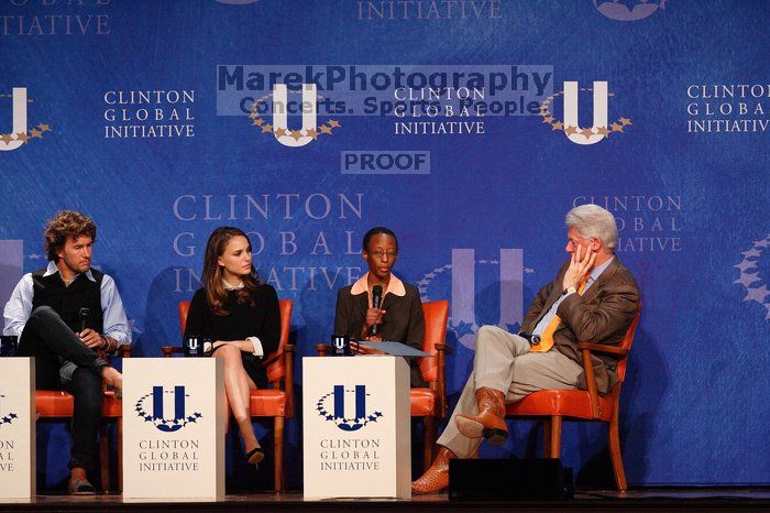 Blake Mycoskie (1-L), founder of TOMS shoes, Natalie Portman (2-L), Mambidzeni Madzivire (2-R), BME graduate student at Mayo Graduate School, and Former President Bill Clinton (1-R) at the first plenary session of the CGIU meeting.  Day one of the 2nd Annual Clinton Global Initiative University (CGIU) meeting was held at The University of Texas at Austin, Friday, February 13, 2009.

Filename: SRM_20090213_17290849.jpg
Aperture: f/4.0
Shutter Speed: 1/320
Body: Canon EOS-1D Mark II
Lens: Canon EF 300mm f/2.8 L IS