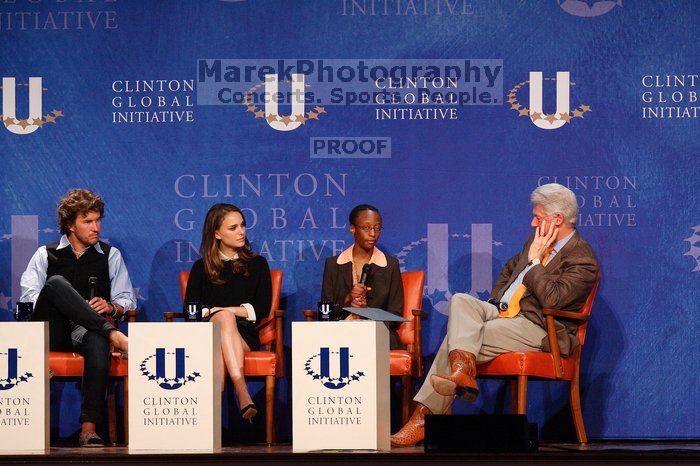 Blake Mycoskie (1-L), founder of TOMS shoes, Natalie Portman (2-L), Mambidzeni Madzivire (2-R), BME graduate student at Mayo Graduate School, and Former President Bill Clinton (1-R) at the first plenary session of the CGIU meeting.  Day one of the 2nd Annual Clinton Global Initiative University (CGIU) meeting was held at The University of Texas at Austin, Friday, February 13, 2009.

Filename: SRM_20090213_17291551.jpg
Aperture: f/5.0
Shutter Speed: 1/200
Body: Canon EOS-1D Mark II
Lens: Canon EF 300mm f/2.8 L IS