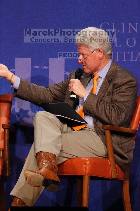 Former President Bill Clinton moderated the discussion between Natalie Portman, Mambidzeni Madzivire, BME graduate student at Mayo Graduate School, Blake Mycoskie, founder of TOMS shoes, and Paul Bell, president of Dell Global Public, during the first plenary session at the CGIU meeting.  Day one of the 2nd Annual Clinton Global Initiative University (CGIU) meeting was held at The University of Texas at Austin, Friday, February 13, 2009.

Filename: SRM_20090213_17362320.jpg
Aperture: f/5.6
Shutter Speed: 1/250
Body: Canon EOS 20D
Lens: Canon EF 300mm f/2.8 L IS