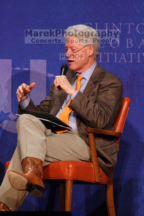 Former President Bill Clinton moderated the discussion between Natalie Portman, Mambidzeni Madzivire, BME graduate student at Mayo Graduate School, Blake Mycoskie, founder of TOMS shoes, and Paul Bell, president of Dell Global Public, during the first plenary session at the CGIU meeting.  Day one of the 2nd Annual Clinton Global Initiative University (CGIU) meeting was held at The University of Texas at Austin, Friday, February 13, 2009.

Filename: SRM_20090213_17394049.jpg
Aperture: f/5.6
Shutter Speed: 1/250
Body: Canon EOS 20D
Lens: Canon EF 300mm f/2.8 L IS