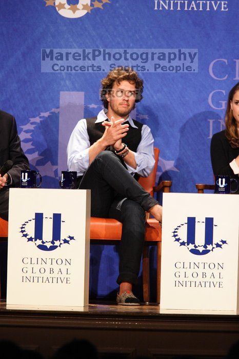 Blake Mycoskie, founder of TOMS shoes, donates one pair of shoes to a third world country for every pair of shoes they sell.  Day one of the 2nd Annual Clinton Global Initiative University (CGIU) meeting was held at The University of Texas at Austin, Friday, February 13, 2009.

Filename: SRM_20090213_17434972.jpg
Aperture: f/4.0
Shutter Speed: 1/160
Body: Canon EOS 20D
Lens: Canon EF 300mm f/2.8 L IS