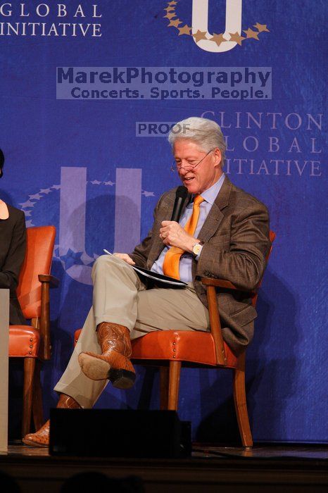 Former President Bill Clinton moderated the discussion between Natalie Portman, Mambidzeni Madzivire, BME graduate student at Mayo Graduate School, Blake Mycoskie, founder of TOMS shoes, and Paul Bell, president of Dell Global Public, during the first plenary session at the CGIU meeting.  Day one of the 2nd Annual Clinton Global Initiative University (CGIU) meeting was held at The University of Texas at Austin, Friday, February 13, 2009.

Filename: SRM_20090213_17440074.jpg
Aperture: f/4.0
Shutter Speed: 1/250
Body: Canon EOS 20D
Lens: Canon EF 300mm f/2.8 L IS