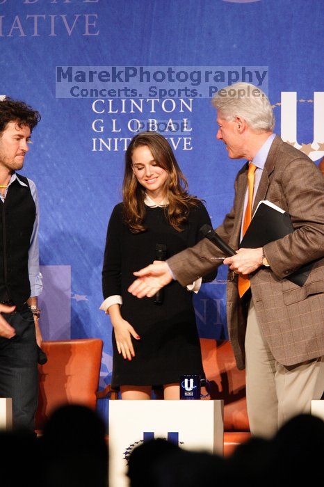 Blake Mycoskie (L), founder of TOMS shoes, Natalie Portman (C), and Former President Bill Clinton (R) at the first plenary session of the CGIU meeting.  Day one of the 2nd Annual Clinton Global Initiative University (CGIU) meeting was held at The University of Texas at Austin, Friday, February 13, 2009.

Filename: SRM_20090213_17441282.jpg
Aperture: f/4.0
Shutter Speed: 1/100
Body: Canon EOS 20D
Lens: Canon EF 300mm f/2.8 L IS