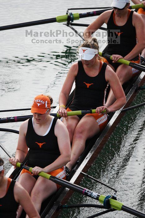 The Texas Rowing first varsity eight team, with coxswain Mary Cait McPherson, stroke Jen VanderMaarel, Felicia Izaguirre-Werner, Meg George, Nancy Arrington, Jelena Zunic, Karli Sheahan, Colleen Irby and Sara Cottingham, finished with a time of 6:44.7, defeating Duke which completed the race in 6:49.9. This was the second session of the Longhorn Invitational, Saturday morning, March 21, 2009 on Lady Bird Lake.  They later won one more race against UCF on Sunday.

Filename: SRM_20090321_08402576.jpg
Aperture: f/2.8
Shutter Speed: 1/2000
Body: Canon EOS-1D Mark II
Lens: Canon EF 300mm f/2.8 L IS