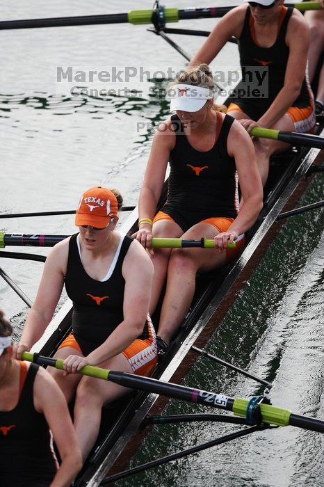 The Texas Rowing first varsity eight team, with coxswain Mary Cait McPherson, stroke Jen VanderMaarel, Felicia Izaguirre-Werner, Meg George, Nancy Arrington, Jelena Zunic, Karli Sheahan, Colleen Irby and Sara Cottingham, finished with a time of 6:44.7, defeating Duke which completed the race in 6:49.9. This was the second session of the Longhorn Invitational, Saturday morning, March 21, 2009 on Lady Bird Lake.  They later won one more race against UCF on Sunday.

Filename: SRM_20090321_08402577.jpg
Aperture: f/2.8
Shutter Speed: 1/2000
Body: Canon EOS-1D Mark II
Lens: Canon EF 300mm f/2.8 L IS