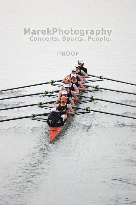 The Texas Rowing first varsity eight team, with coxswain Mary Cait McPherson, stroke Jen VanderMaarel, Felicia Izaguirre-Werner, Meg George, Nancy Arrington, Jelena Zunic, Karli Sheahan, Colleen Irby and Sara Cottingham, finished with a time of 6:44.7, defeating Duke which completed the race in 6:49.9. This was the second session of the Longhorn Invitational, Saturday morning, March 21, 2009 on Lady Bird Lake.  They later won one more race against UCF on Sunday.

Filename: SRM_20090321_08403584.jpg
Aperture: f/2.8
Shutter Speed: 1/2000
Body: Canon EOS-1D Mark II
Lens: Canon EF 300mm f/2.8 L IS