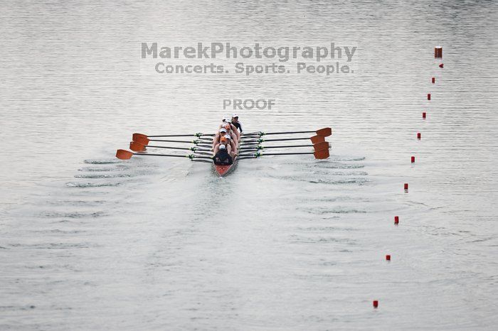 The Texas Rowing first varsity eight team, with coxswain Mary Cait McPherson, stroke Jen VanderMaarel, Felicia Izaguirre-Werner, Meg George, Nancy Arrington, Jelena Zunic, Karli Sheahan, Colleen Irby and Sara Cottingham, finished with a time of 6:44.7, defeating Duke which completed the race in 6:49.9. This was the second session of the Longhorn Invitational, Saturday morning, March 21, 2009 on Lady Bird Lake.  They later won one more race against UCF on Sunday.

Filename: SRM_20090321_08404989.jpg
Aperture: f/2.8
Shutter Speed: 1/3200
Body: Canon EOS-1D Mark II
Lens: Canon EF 300mm f/2.8 L IS