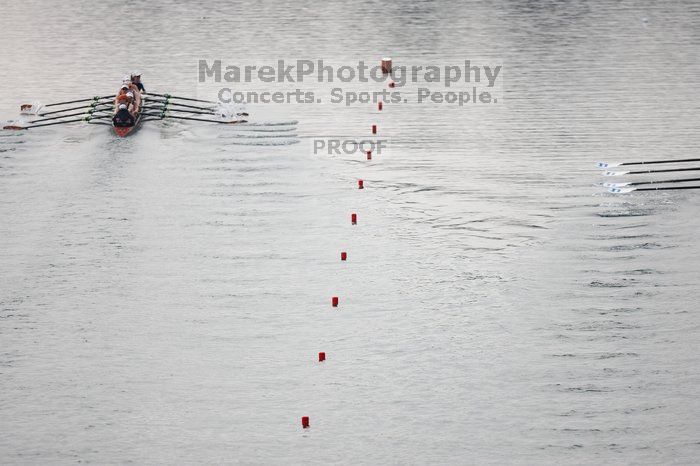 The Texas Rowing first varsity eight team, with coxswain Mary Cait McPherson, stroke Jen VanderMaarel, Felicia Izaguirre-Werner, Meg George, Nancy Arrington, Jelena Zunic, Karli Sheahan, Colleen Irby and Sara Cottingham, finished with a time of 6:44.7, defeating Duke which completed the race in 6:49.9. This was the second session of the Longhorn Invitational, Saturday morning, March 21, 2009 on Lady Bird Lake.  They later won one more race against UCF on Sunday.

Filename: SRM_20090321_08405692.jpg
Aperture: f/2.8
Shutter Speed: 1/3200
Body: Canon EOS-1D Mark II
Lens: Canon EF 300mm f/2.8 L IS