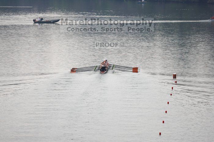 The Texas Rowing first varsity eight team, with coxswain Mary Cait McPherson, stroke Jen VanderMaarel, Felicia Izaguirre-Werner, Meg George, Nancy Arrington, Jelena Zunic, Karli Sheahan, Colleen Irby and Sara Cottingham, finished with a time of 6:44.7, defeating Duke which completed the race in 6:49.9. This was the second session of the Longhorn Invitational, Saturday morning, March 21, 2009 on Lady Bird Lake.  They later won one more race against UCF on Sunday.

Filename: SRM_20090321_08410395.jpg
Aperture: f/2.8
Shutter Speed: 1/3200
Body: Canon EOS-1D Mark II
Lens: Canon EF 300mm f/2.8 L IS