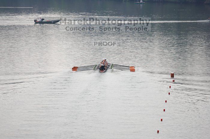 The Texas Rowing first varsity eight team, with coxswain Mary Cait McPherson, stroke Jen VanderMaarel, Felicia Izaguirre-Werner, Meg George, Nancy Arrington, Jelena Zunic, Karli Sheahan, Colleen Irby and Sara Cottingham, finished with a time of 6:44.7, defeating Duke which completed the race in 6:49.9. This was the second session of the Longhorn Invitational, Saturday morning, March 21, 2009 on Lady Bird Lake.  They later won one more race against UCF on Sunday.

Filename: SRM_20090321_08410396.jpg
Aperture: f/2.8
Shutter Speed: 1/3200
Body: Canon EOS-1D Mark II
Lens: Canon EF 300mm f/2.8 L IS