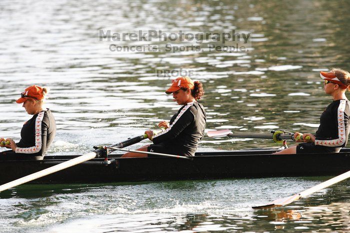 The Texas Rowing second novice eight team, with coxswain Emma Dirks, Sharon Dietz, Lucia Babar, Kait Postle, Ashley Hiatt, Andrea Janowski, Madonna Bregon, Daryn Ofczarzak and Dani Mohling, finished with a time of 7:34.5, defeating Iowa which completed the race in 7:35.6. This was the second session of the Longhorn Invitational, Saturday morning, March 21, 2009 on Lady Bird Lake.  They won a total of three races over the weekend.

Filename: SRM_20090321_08510320.jpg
Aperture: f/4.0
Shutter Speed: 1/1600
Body: Canon EOS-1D Mark II
Lens: Canon EF 300mm f/2.8 L IS