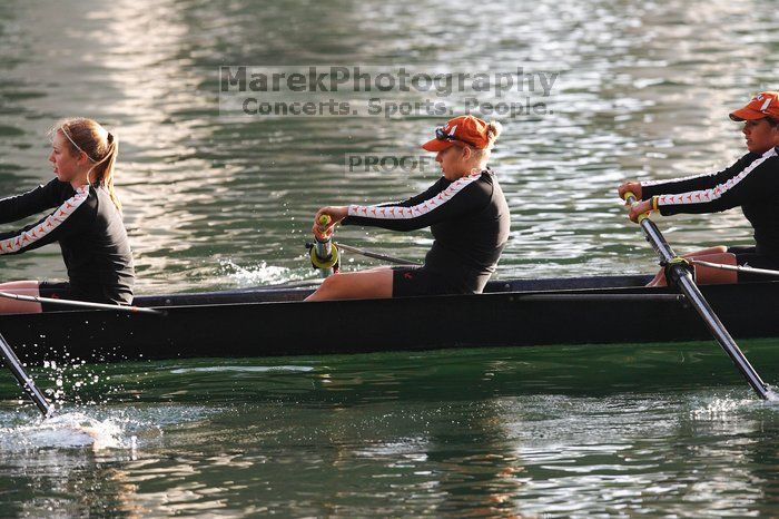 The Texas Rowing second novice eight team, with coxswain Emma Dirks, Sharon Dietz, Lucia Babar, Kait Postle, Ashley Hiatt, Andrea Janowski, Madonna Bregon, Daryn Ofczarzak and Dani Mohling, finished with a time of 7:34.5, defeating Iowa which completed the race in 7:35.6. This was the second session of the Longhorn Invitational, Saturday morning, March 21, 2009 on Lady Bird Lake.  They won a total of three races over the weekend.

Filename: SRM_20090321_08510521.jpg
Aperture: f/4.0
Shutter Speed: 1/1600
Body: Canon EOS-1D Mark II
Lens: Canon EF 300mm f/2.8 L IS