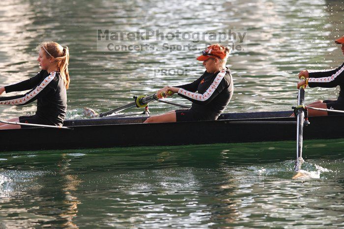 The Texas Rowing second novice eight team, with coxswain Emma Dirks, Sharon Dietz, Lucia Babar, Kait Postle, Ashley Hiatt, Andrea Janowski, Madonna Bregon, Daryn Ofczarzak and Dani Mohling, finished with a time of 7:34.5, defeating Iowa which completed the race in 7:35.6. This was the second session of the Longhorn Invitational, Saturday morning, March 21, 2009 on Lady Bird Lake.  They won a total of three races over the weekend.

Filename: SRM_20090321_08510522.jpg
Aperture: f/4.0
Shutter Speed: 1/1600
Body: Canon EOS-1D Mark II
Lens: Canon EF 300mm f/2.8 L IS