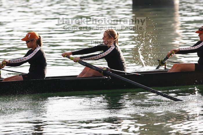 The Texas Rowing second novice eight team, with coxswain Emma Dirks, Sharon Dietz, Lucia Babar, Kait Postle, Ashley Hiatt, Andrea Janowski, Madonna Bregon, Daryn Ofczarzak and Dani Mohling, finished with a time of 7:34.5, defeating Iowa which completed the race in 7:35.6. This was the second session of the Longhorn Invitational, Saturday morning, March 21, 2009 on Lady Bird Lake.  They won a total of three races over the weekend.

Filename: SRM_20090321_08510725.jpg
Aperture: f/4.0
Shutter Speed: 1/1600
Body: Canon EOS-1D Mark II
Lens: Canon EF 300mm f/2.8 L IS