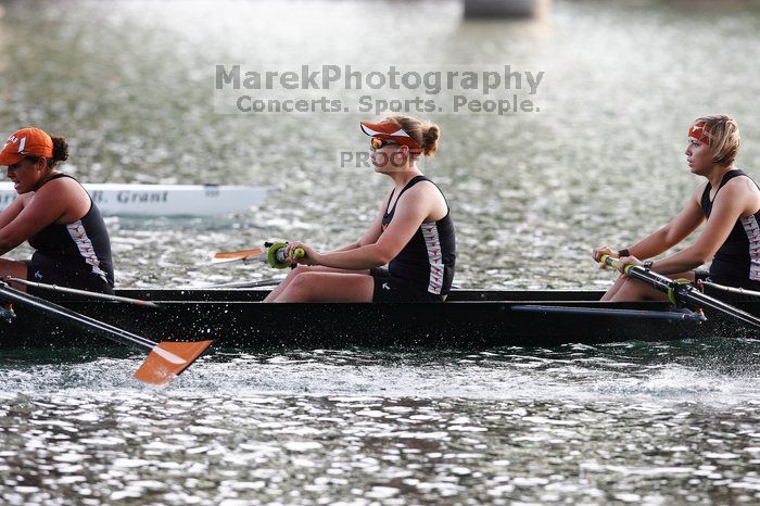 The Texas Rowing second novice eight team, with coxswain Emma Dirks, Sharon Dietz, Lucia Babar, Kait Postle, Ashley Hiatt, Andrea Janowski, Madonna Bregon, Daryn Ofczarzak and Dani Mohling, finished with a time of 7:34.5, defeating Iowa which completed the race in 7:35.6. This was the second session of the Longhorn Invitational, Saturday morning, March 21, 2009 on Lady Bird Lake.  They won a total of three races over the weekend.

Filename: SRM_20090321_09351652.jpg
Aperture: f/4.0
Shutter Speed: 1/1250
Body: Canon EOS-1D Mark II
Lens: Canon EF 300mm f/2.8 L IS