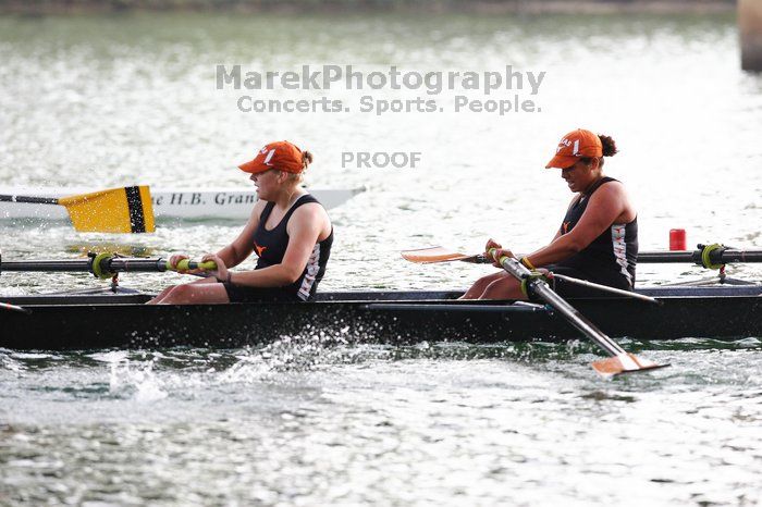 The Texas Rowing second novice eight team, with coxswain Emma Dirks, Sharon Dietz, Lucia Babar, Kait Postle, Ashley Hiatt, Andrea Janowski, Madonna Bregon, Daryn Ofczarzak and Dani Mohling, finished with a time of 7:34.5, defeating Iowa which completed the race in 7:35.6. This was the second session of the Longhorn Invitational, Saturday morning, March 21, 2009 on Lady Bird Lake.  They won a total of three races over the weekend.

Filename: SRM_20090321_09351760.jpg
Aperture: f/4.0
Shutter Speed: 1/1250
Body: Canon EOS-1D Mark II
Lens: Canon EF 300mm f/2.8 L IS