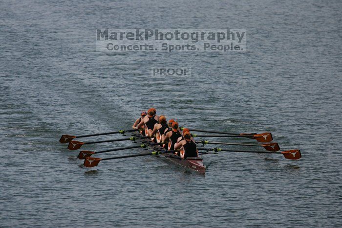 The Texas Rowing second varsity eight team finished with a time of 7:29.5, losing to Wisconsin, which completed the race in 7:15.5. This was the third session of the Longhorn Invitational, Saturday afternoon, March 21, 2009 on Lady Bird Lake.

Filename: SRM_20090321_16282320.jpg
Aperture: f/4.0
Shutter Speed: 1/5000
Body: Canon EOS-1D Mark II
Lens: Canon EF 300mm f/2.8 L IS