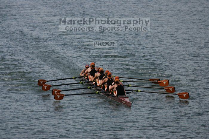 The Texas Rowing second varsity eight team finished with a time of 7:29.5, losing to Wisconsin, which completed the race in 7:15.5. This was the third session of the Longhorn Invitational, Saturday afternoon, March 21, 2009 on Lady Bird Lake.

Filename: SRM_20090321_16282528.jpg
Aperture: f/4.0
Shutter Speed: 1/5000
Body: Canon EOS-1D Mark II
Lens: Canon EF 300mm f/2.8 L IS