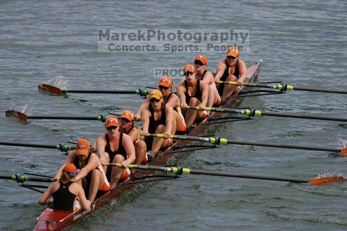 The Texas Rowing second varsity eight team finished with a time of 7:29.5, losing to Wisconsin, which completed the race in 7:15.5. This was the third session of the Longhorn Invitational, Saturday afternoon, March 21, 2009 on Lady Bird Lake.

Filename: SRM_20090321_16290769.jpg
Aperture: f/4.0
Shutter Speed: 1/3200
Body: Canon EOS-1D Mark II
Lens: Canon EF 300mm f/2.8 L IS