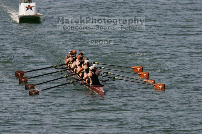 The Texas Rowing first varsity eight team, with coxswain Mary Cait McPherson, stroke Jen VanderMaarel, Felicia Izaguirre-Werner, Meg George, Nancy Arrington, Jelena Zunic, Karli Sheahan, Colleen Irby and Sara Cottingham, finished with a time of 7:09.3, losing to Wisconsin, which completed the race in 7:01.1. This was the third session of the Longhorn Invitational, Saturday afternoon, March 21, 2009 on Lady Bird Lake.

Filename: SRM_20090321_16352201.jpg
Aperture: f/8.0
Shutter Speed: 1/1600
Body: Canon EOS-1D Mark II
Lens: Canon EF 300mm f/2.8 L IS