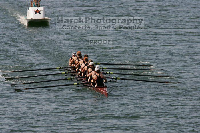 The Texas Rowing first varsity eight team, with coxswain Mary Cait McPherson, stroke Jen VanderMaarel, Felicia Izaguirre-Werner, Meg George, Nancy Arrington, Jelena Zunic, Karli Sheahan, Colleen Irby and Sara Cottingham, finished with a time of 7:09.3, losing to Wisconsin, which completed the race in 7:01.1. This was the third session of the Longhorn Invitational, Saturday afternoon, March 21, 2009 on Lady Bird Lake.

Filename: SRM_20090321_16352298.jpg
Aperture: f/8.0
Shutter Speed: 1/1600
Body: Canon EOS-1D Mark II
Lens: Canon EF 300mm f/2.8 L IS