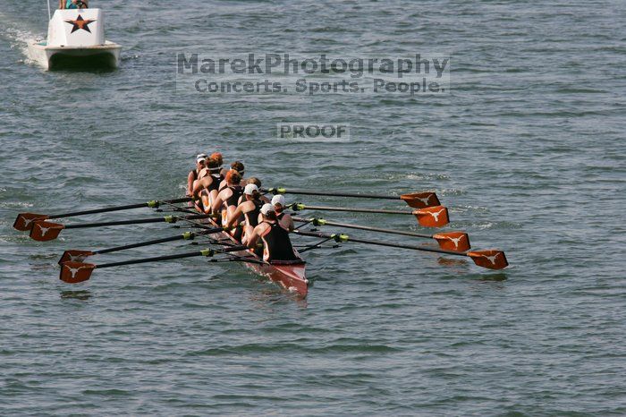 The Texas Rowing first varsity eight team, with coxswain Mary Cait McPherson, stroke Jen VanderMaarel, Felicia Izaguirre-Werner, Meg George, Nancy Arrington, Jelena Zunic, Karli Sheahan, Colleen Irby and Sara Cottingham, finished with a time of 7:09.3, losing to Wisconsin, which completed the race in 7:01.1. This was the third session of the Longhorn Invitational, Saturday afternoon, March 21, 2009 on Lady Bird Lake.

Filename: SRM_20090321_16352299.jpg
Aperture: f/8.0
Shutter Speed: 1/1250
Body: Canon EOS-1D Mark II
Lens: Canon EF 300mm f/2.8 L IS