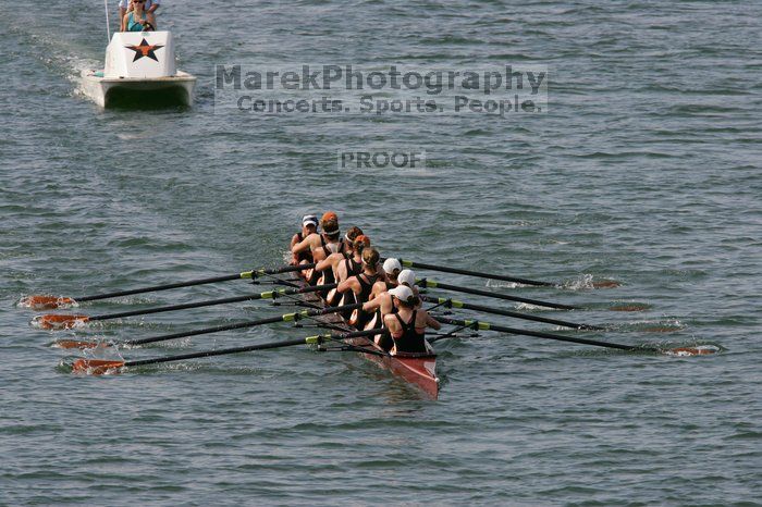 The Texas Rowing first varsity eight team, with coxswain Mary Cait McPherson, stroke Jen VanderMaarel, Felicia Izaguirre-Werner, Meg George, Nancy Arrington, Jelena Zunic, Karli Sheahan, Colleen Irby and Sara Cottingham, finished with a time of 7:09.3, losing to Wisconsin, which completed the race in 7:01.1. This was the third session of the Longhorn Invitational, Saturday afternoon, March 21, 2009 on Lady Bird Lake.

Filename: SRM_20090321_16352302.jpg
Aperture: f/8.0
Shutter Speed: 1/1600
Body: Canon EOS-1D Mark II
Lens: Canon EF 300mm f/2.8 L IS