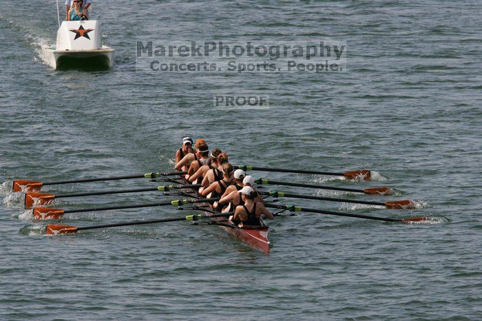 The Texas Rowing first varsity eight team, with coxswain Mary Cait McPherson, stroke Jen VanderMaarel, Felicia Izaguirre-Werner, Meg George, Nancy Arrington, Jelena Zunic, Karli Sheahan, Colleen Irby and Sara Cottingham, finished with a time of 7:09.3, losing to Wisconsin, which completed the race in 7:01.1. This was the third session of the Longhorn Invitational, Saturday afternoon, March 21, 2009 on Lady Bird Lake.

Filename: SRM_20090321_16352303.jpg
Aperture: f/8.0
Shutter Speed: 1/1600
Body: Canon EOS-1D Mark II
Lens: Canon EF 300mm f/2.8 L IS