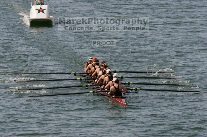 The Texas Rowing first varsity eight team, with coxswain Mary Cait McPherson, stroke Jen VanderMaarel, Felicia Izaguirre-Werner, Meg George, Nancy Arrington, Jelena Zunic, Karli Sheahan, Colleen Irby and Sara Cottingham, finished with a time of 7:09.3, losing to Wisconsin, which completed the race in 7:01.1. This was the third session of the Longhorn Invitational, Saturday afternoon, March 21, 2009 on Lady Bird Lake.

Filename: SRM_20090321_16352305.jpg
Aperture: f/8.0
Shutter Speed: 1/1600
Body: Canon EOS-1D Mark II
Lens: Canon EF 300mm f/2.8 L IS