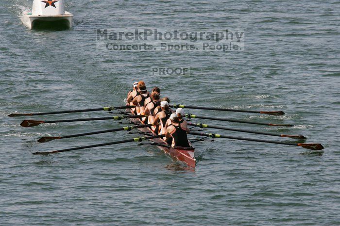 The Texas Rowing first varsity eight team, with coxswain Mary Cait McPherson, stroke Jen VanderMaarel, Felicia Izaguirre-Werner, Meg George, Nancy Arrington, Jelena Zunic, Karli Sheahan, Colleen Irby and Sara Cottingham, finished with a time of 7:09.3, losing to Wisconsin, which completed the race in 7:01.1. This was the third session of the Longhorn Invitational, Saturday afternoon, March 21, 2009 on Lady Bird Lake.

Filename: SRM_20090321_16352406.jpg
Aperture: f/8.0
Shutter Speed: 1/1250
Body: Canon EOS-1D Mark II
Lens: Canon EF 300mm f/2.8 L IS