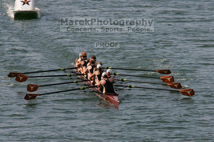 The Texas Rowing first varsity eight team, with coxswain Mary Cait McPherson, stroke Jen VanderMaarel, Felicia Izaguirre-Werner, Meg George, Nancy Arrington, Jelena Zunic, Karli Sheahan, Colleen Irby and Sara Cottingham, finished with a time of 7:09.3, losing to Wisconsin, which completed the race in 7:01.1. This was the third session of the Longhorn Invitational, Saturday afternoon, March 21, 2009 on Lady Bird Lake.

Filename: SRM_20090321_16352407.jpg
Aperture: f/8.0
Shutter Speed: 1/1600
Body: Canon EOS-1D Mark II
Lens: Canon EF 300mm f/2.8 L IS