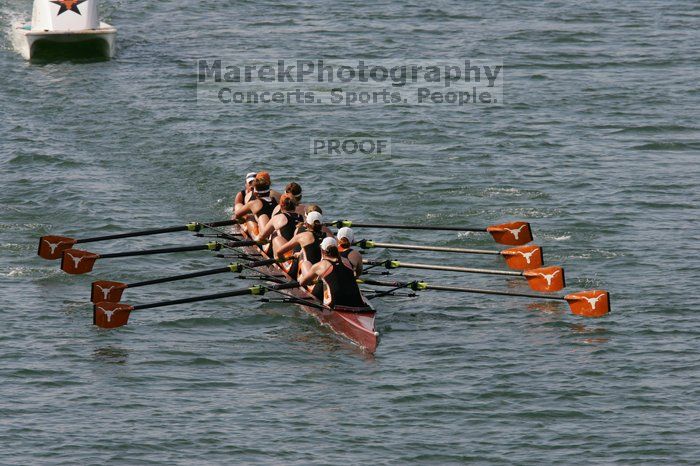 The Texas Rowing first varsity eight team, with coxswain Mary Cait McPherson, stroke Jen VanderMaarel, Felicia Izaguirre-Werner, Meg George, Nancy Arrington, Jelena Zunic, Karli Sheahan, Colleen Irby and Sara Cottingham, finished with a time of 7:09.3, losing to Wisconsin, which completed the race in 7:01.1. This was the third session of the Longhorn Invitational, Saturday afternoon, March 21, 2009 on Lady Bird Lake.

Filename: SRM_20090321_16352408.jpg
Aperture: f/8.0
Shutter Speed: 1/1600
Body: Canon EOS-1D Mark II
Lens: Canon EF 300mm f/2.8 L IS