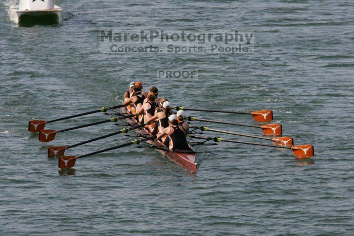 The Texas Rowing first varsity eight team, with coxswain Mary Cait McPherson, stroke Jen VanderMaarel, Felicia Izaguirre-Werner, Meg George, Nancy Arrington, Jelena Zunic, Karli Sheahan, Colleen Irby and Sara Cottingham, finished with a time of 7:09.3, losing to Wisconsin, which completed the race in 7:01.1. This was the third session of the Longhorn Invitational, Saturday afternoon, March 21, 2009 on Lady Bird Lake.

Filename: SRM_20090321_16352409.jpg
Aperture: f/8.0
Shutter Speed: 1/1600
Body: Canon EOS-1D Mark II
Lens: Canon EF 300mm f/2.8 L IS